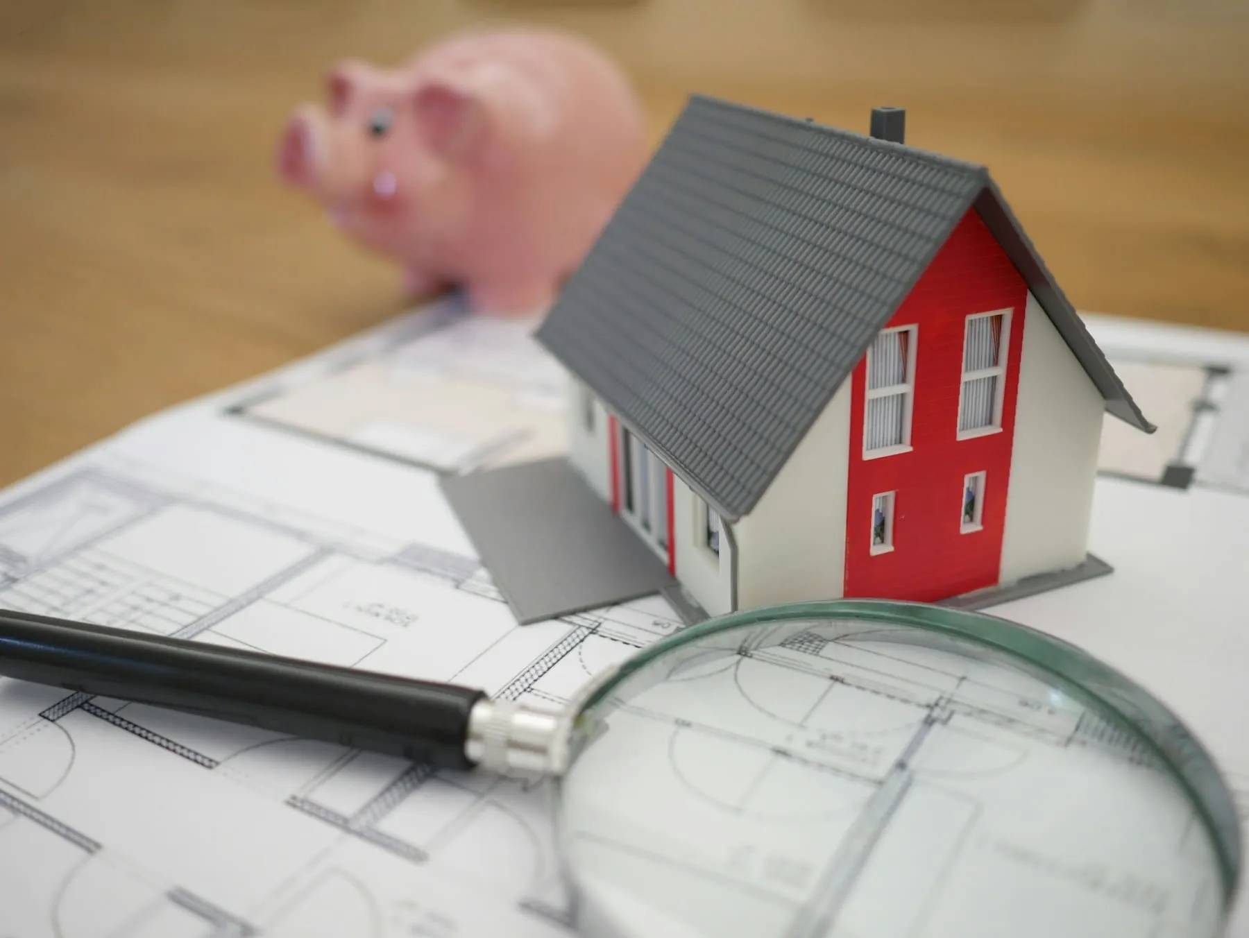 A real estate agent reviewing home plans with a buyer