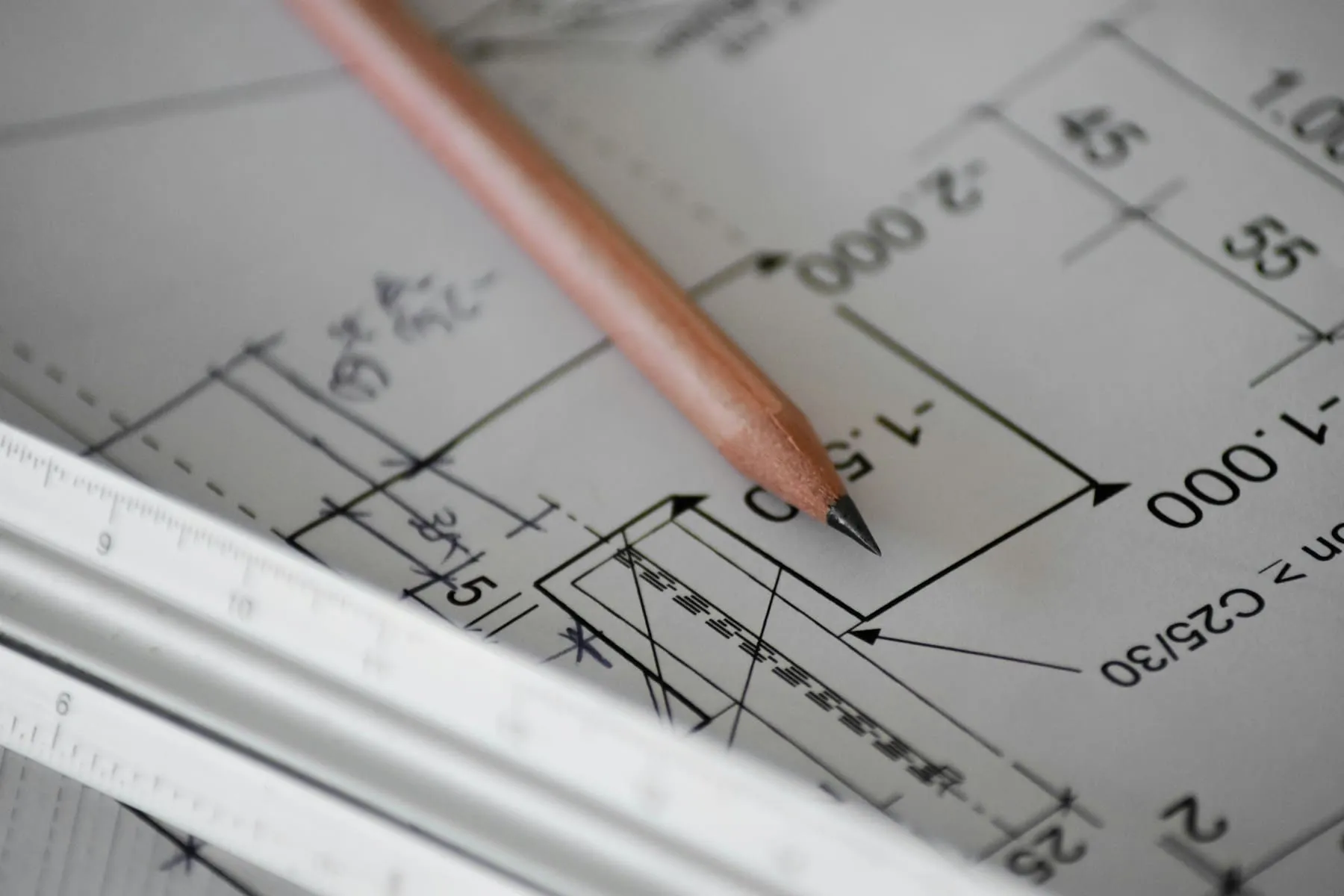 A clipboard with mortgage and appraisal paperwork