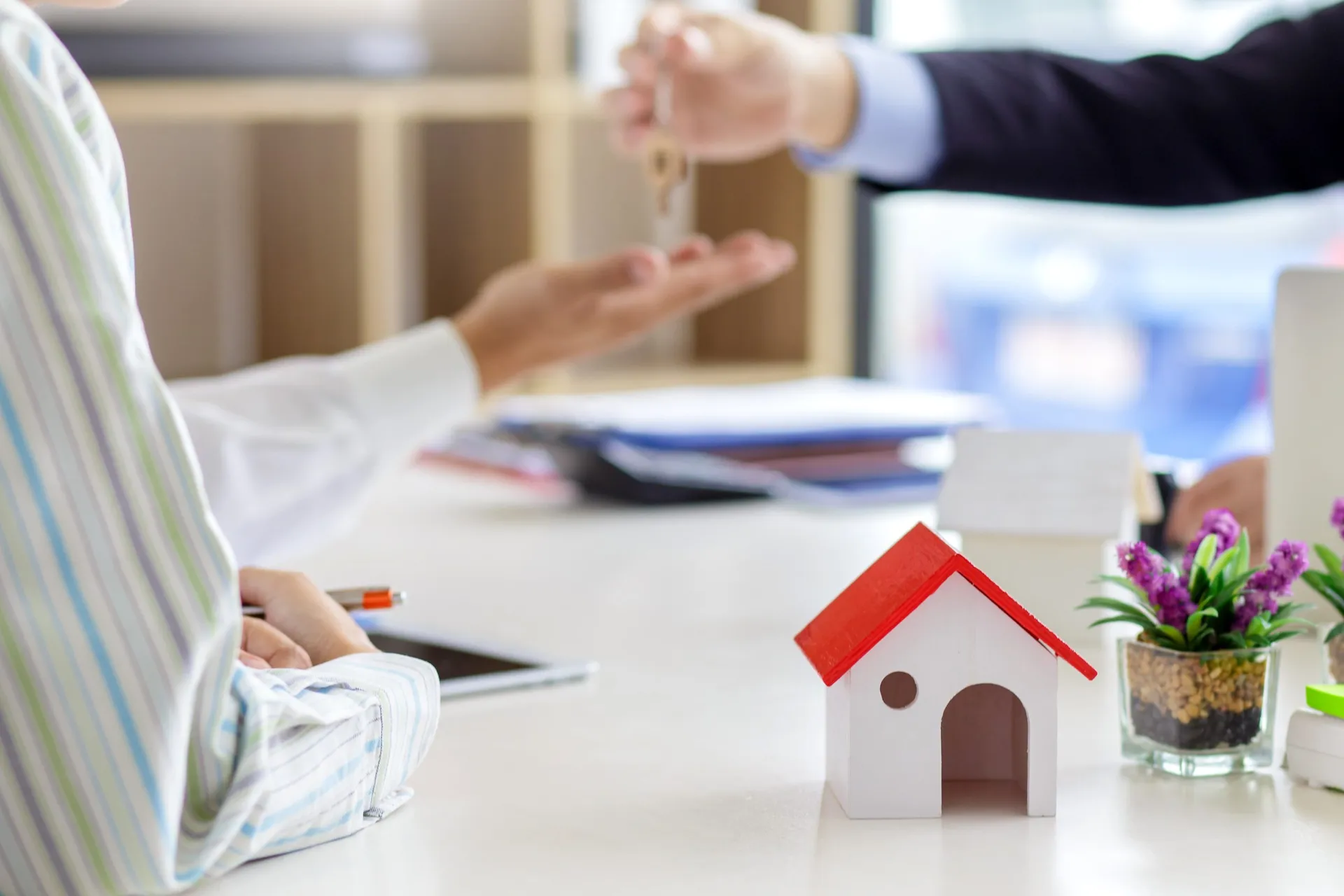 Davis homebuyer reviewing options with their real estate agent